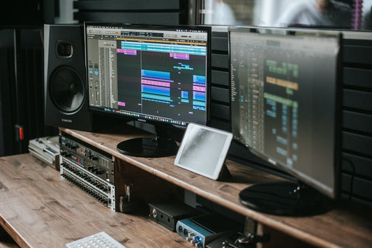 two monitors with a mixing software open