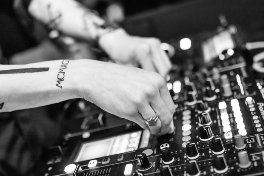 man mixing music