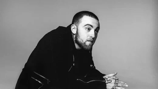Mac miller putting his hands together