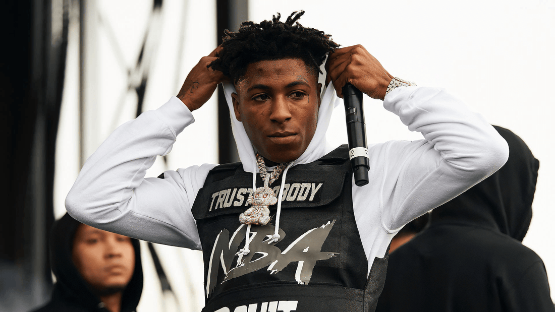 NBA YoungBoy pulling up his hood
