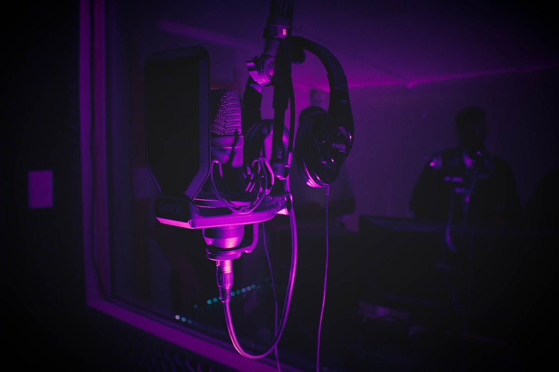 headphones on a stand in a music production studio