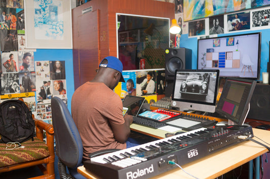 man producing music